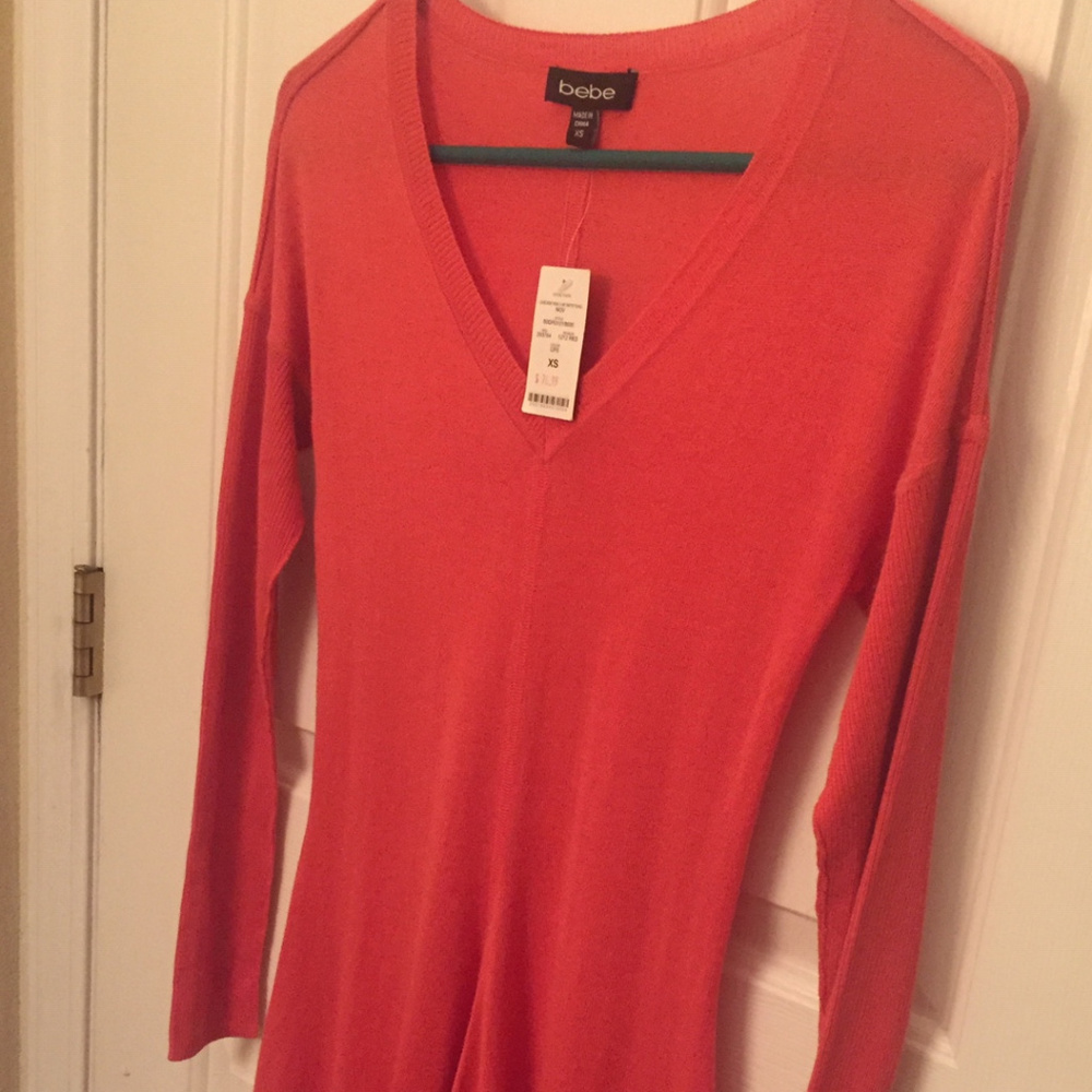 Beautiful Bebe cascade hem sweater tunic
